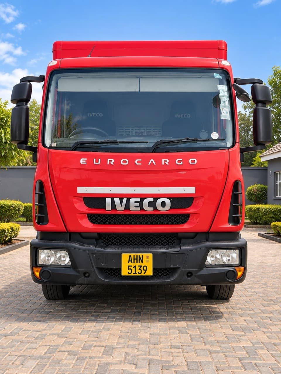 Front view of the box truck on a driveway